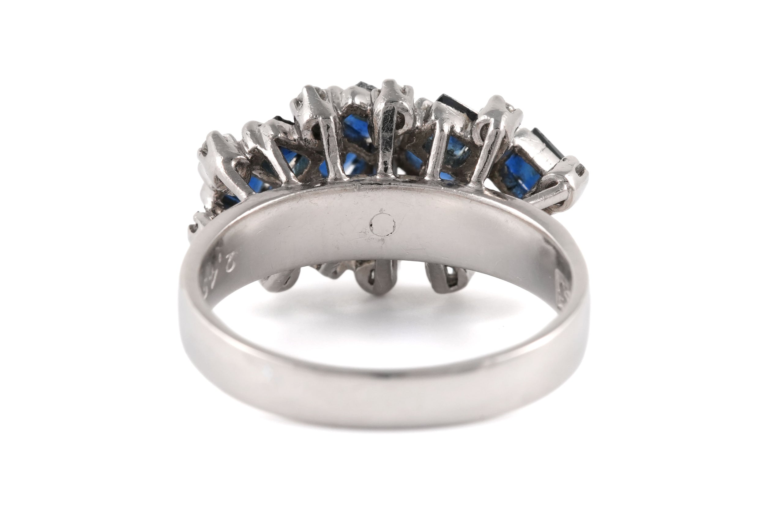 White gold ring with sapphires and diamonds