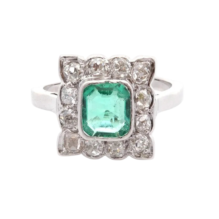 "Entourage" Ring in White Gold, Emerald, and Diamonds