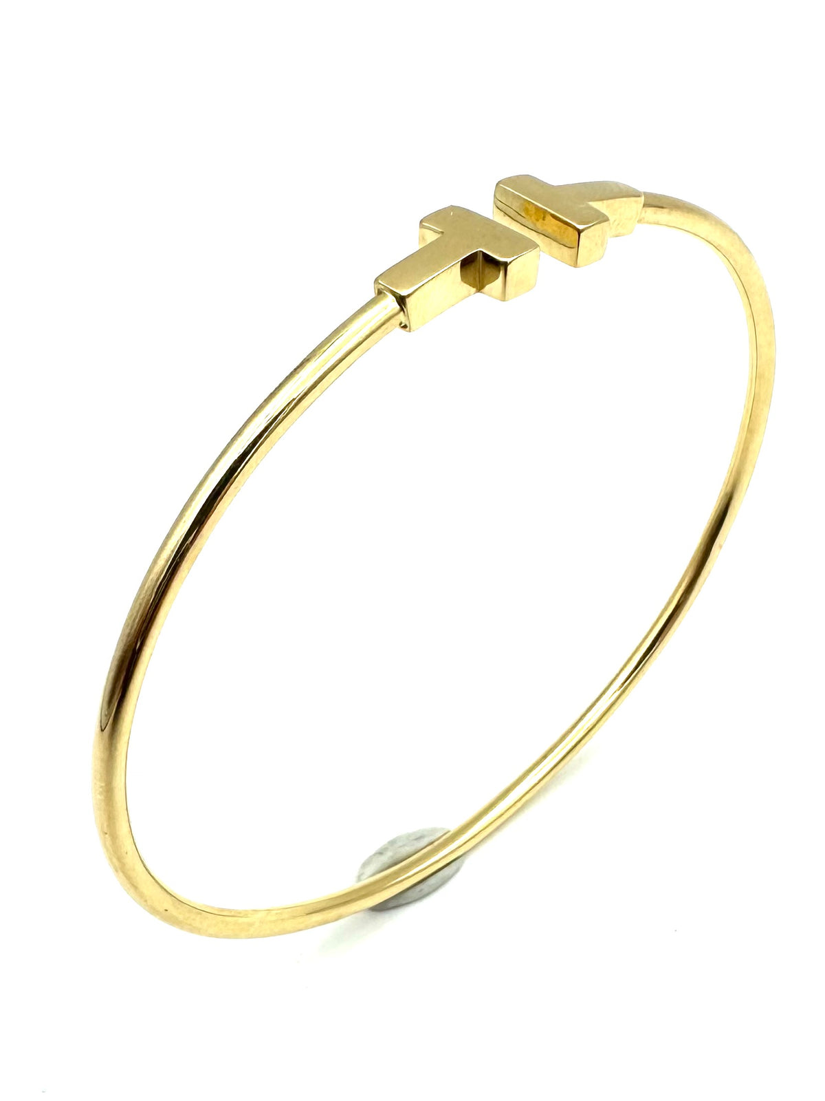 TIFFANY & CO. "Tiffany T" Yellow Gold Bangle Bracelet