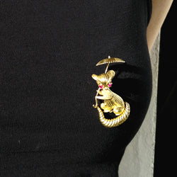 Champagne-colored gold and Ruby brooch