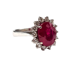 Entourage Ring in white gold, rubies, and diamonds