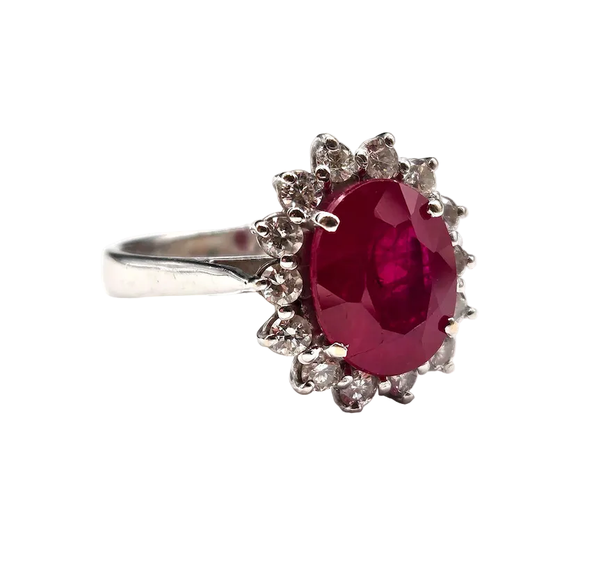 Entourage Ring in white gold, rubies, and diamonds