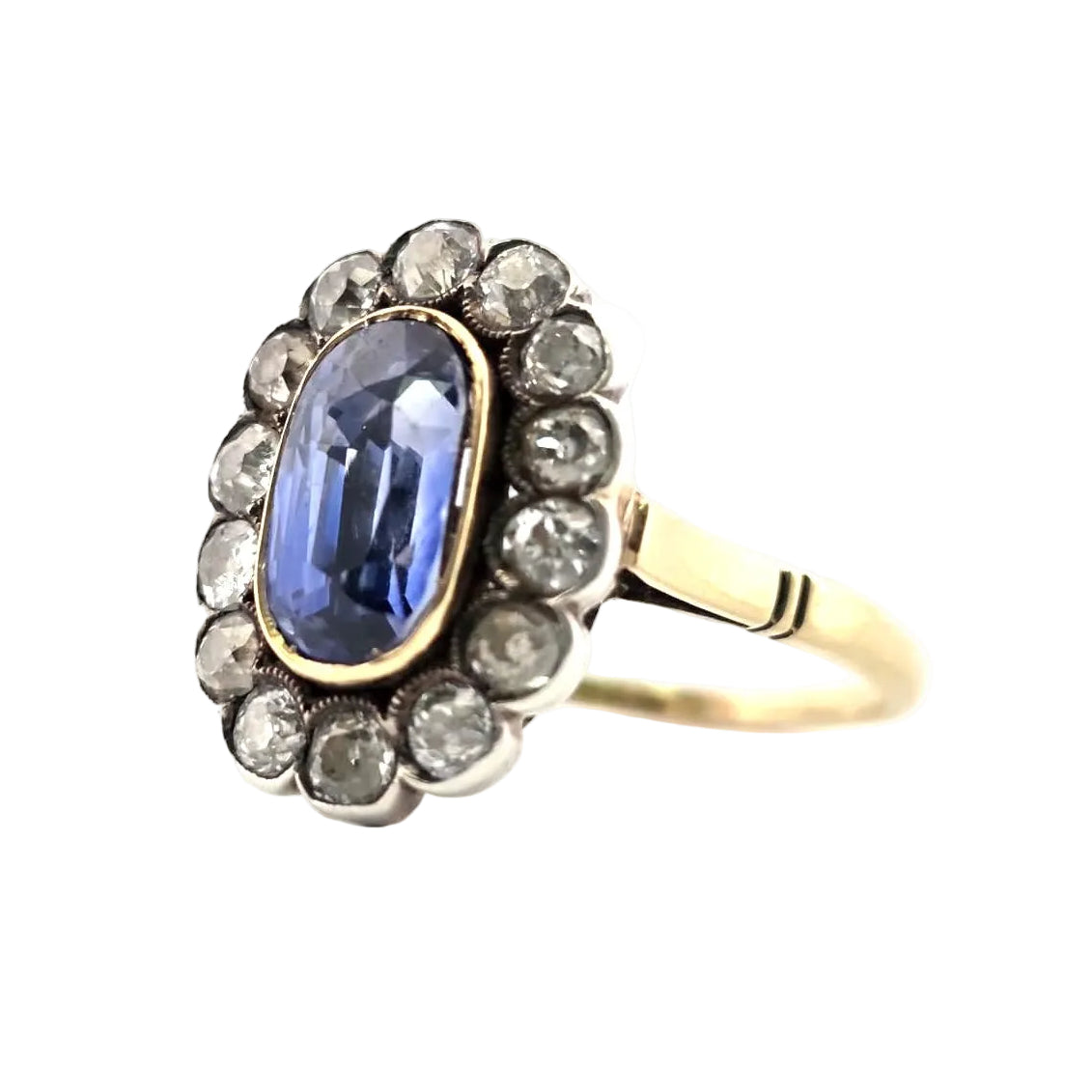 Entourage Ring in yellow gold, silver, sapphire, and diamonds
