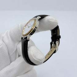 HERMÈS "Clipper" Watch in yellow gold, stainless steel, and leather