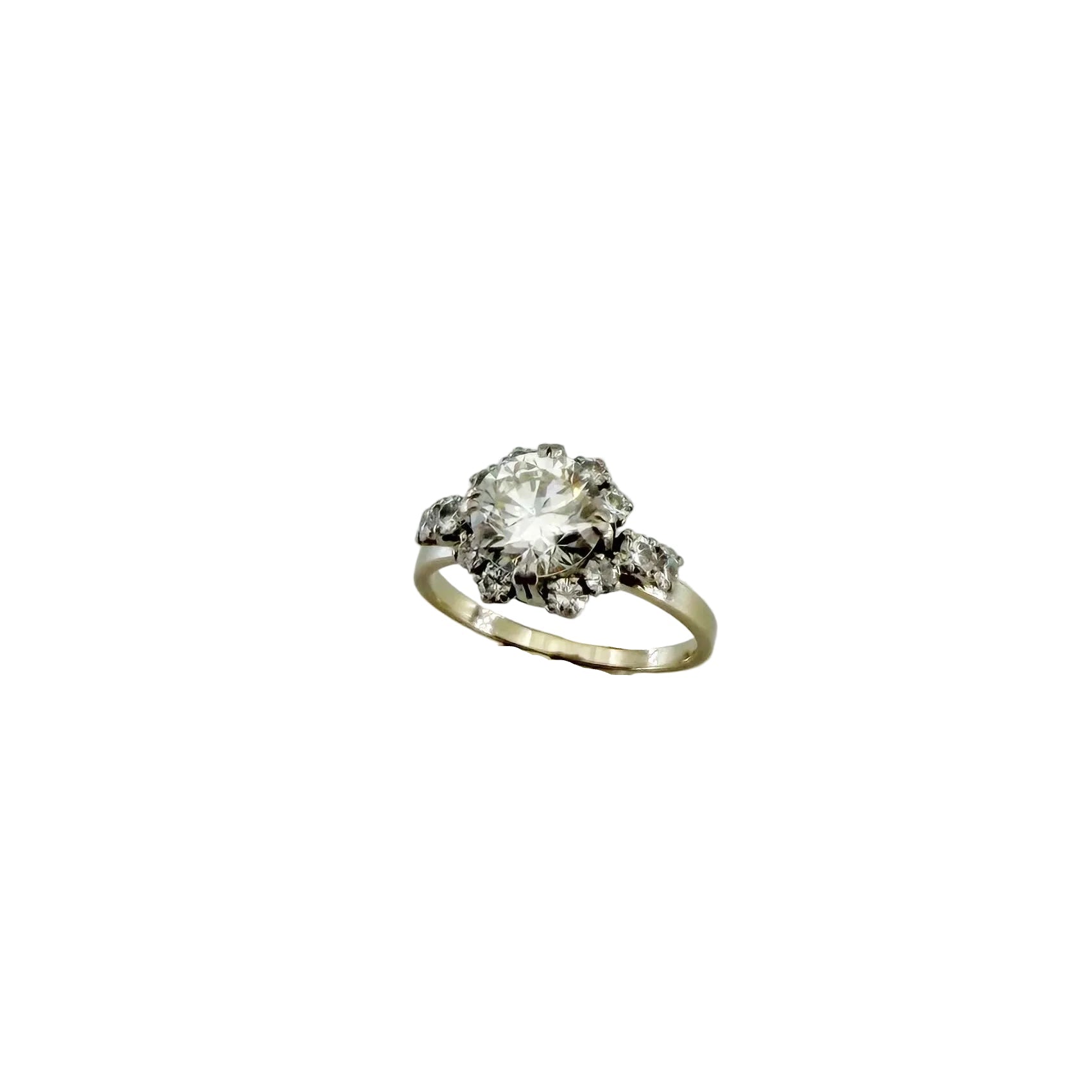 Solitaire Ring in Platinum, White Gold, and Diamonds