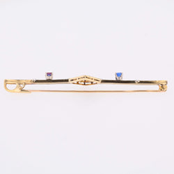 Brooch made of yellow gold, platinum, sapphires, and diamonds