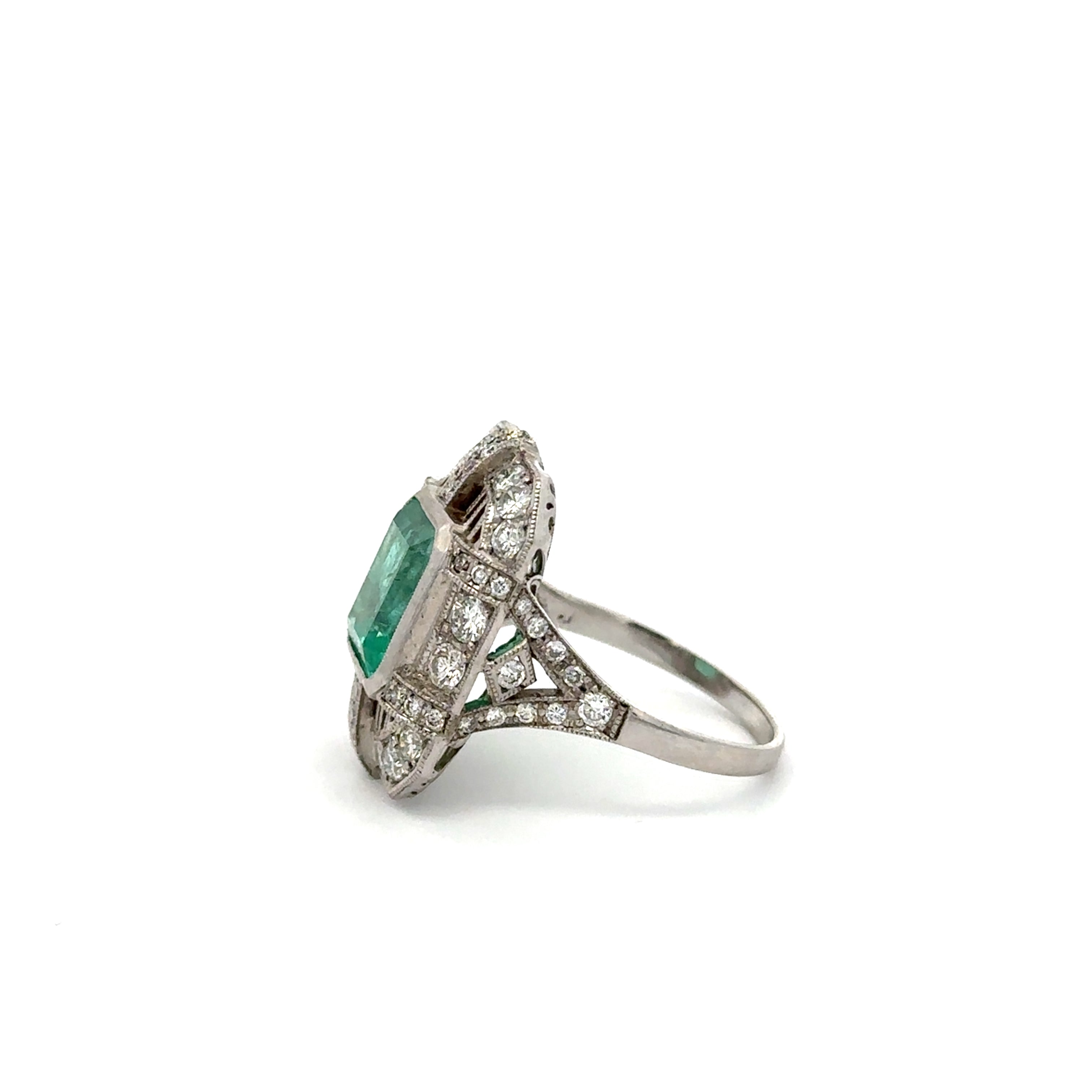 "Entourage" Ring in White Gold, Emerald, and Diamonds