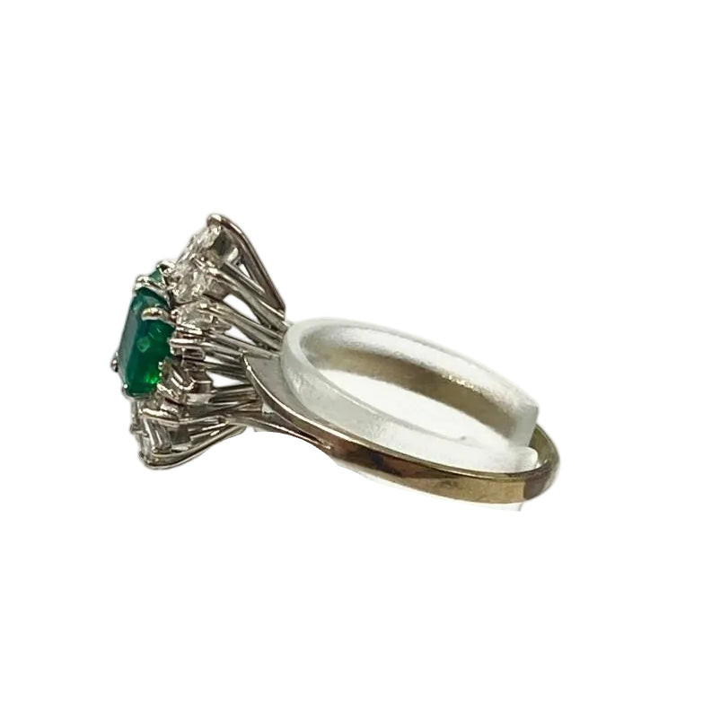 "Entourage" Ring in White Gold, Emeralds, and Diamonds