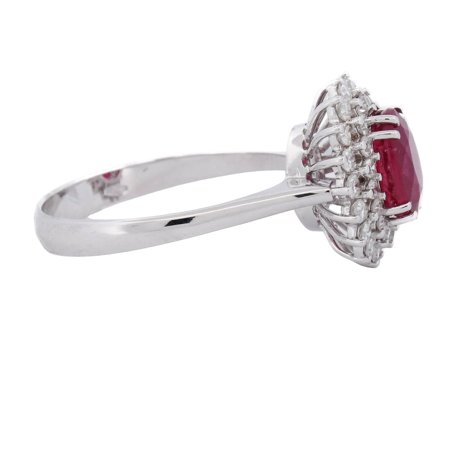 Entourage Ring in white gold, rubies, and diamonds