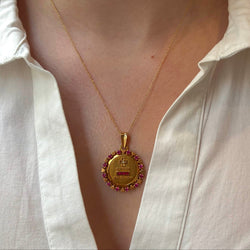 AUGIS Medal in yellow gold, rubies, and diamonds
