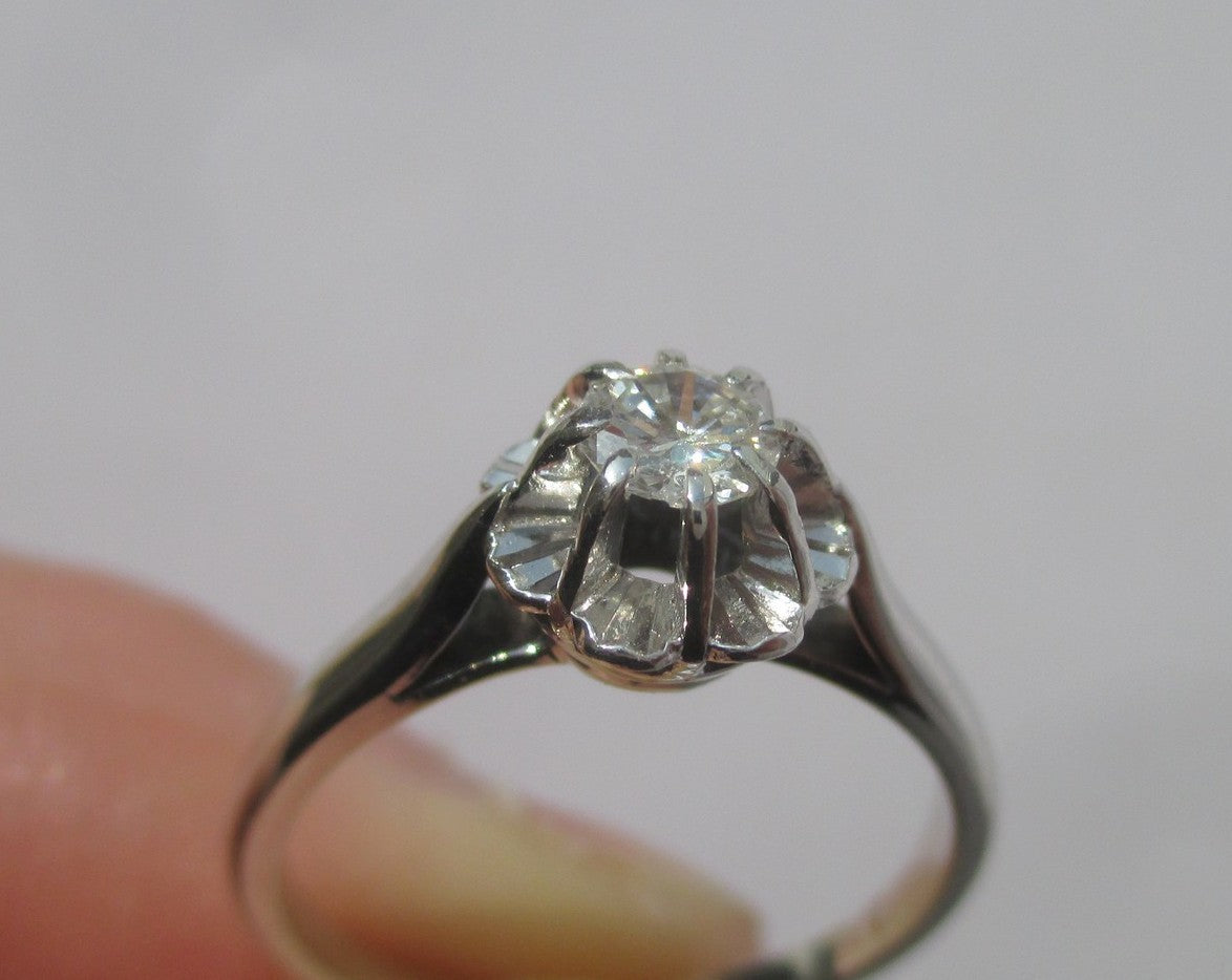 Solitaire Ring in White Gold, Platinum, and Diamond