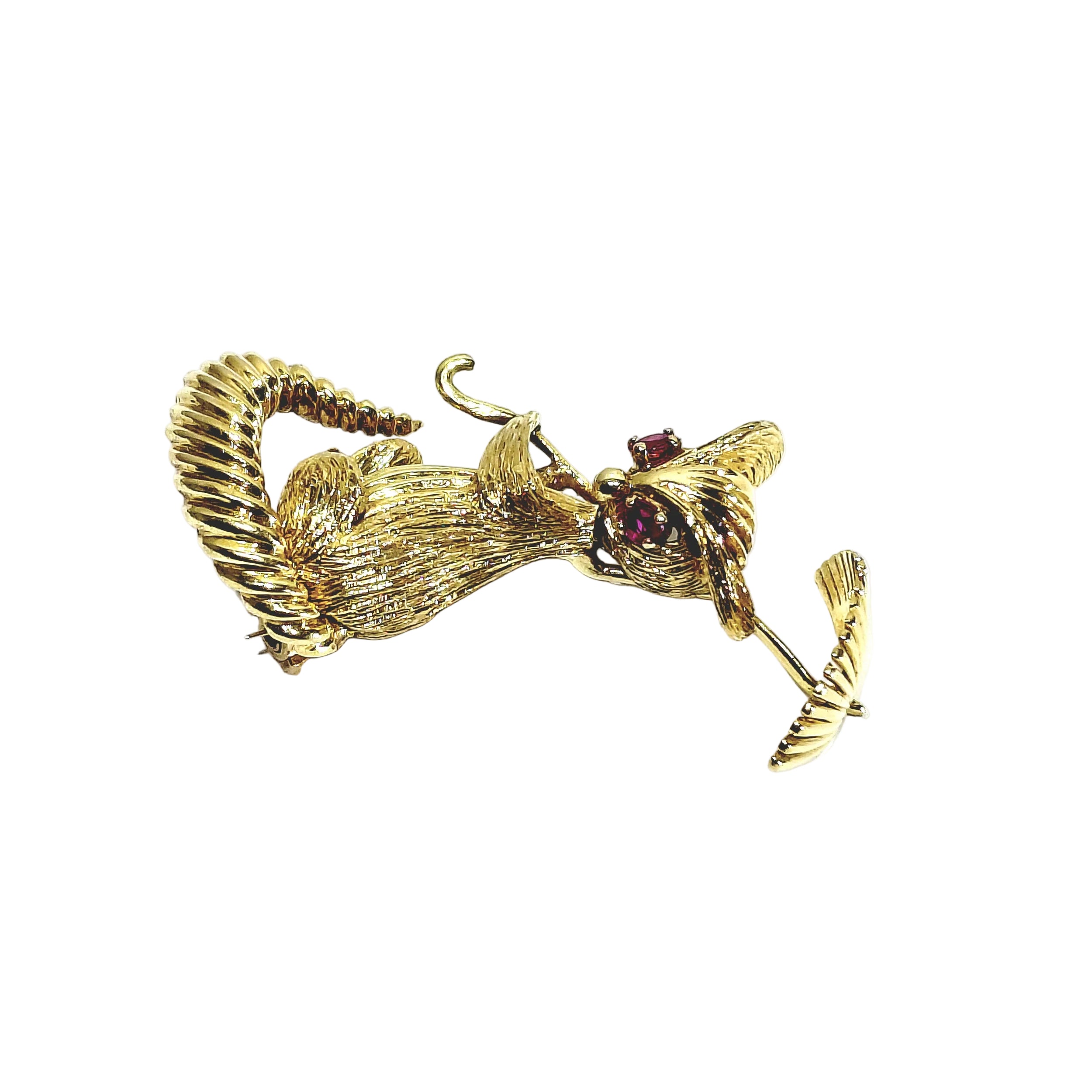 Champagne-colored gold and Ruby brooch