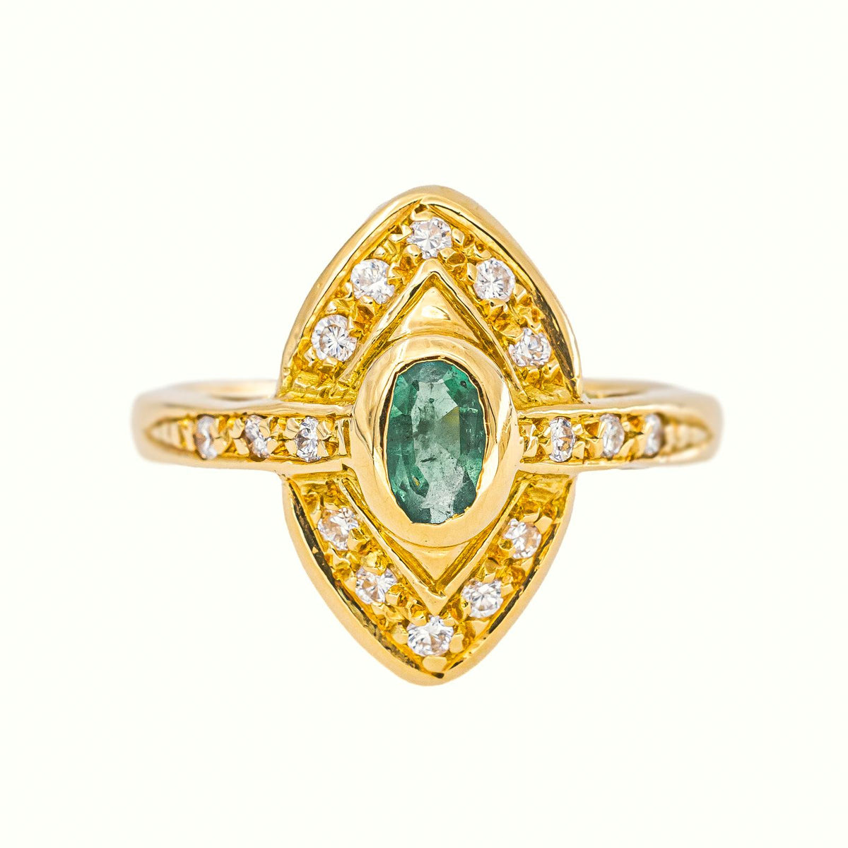 Marquise Ring in Yellow Gold with an Emerald