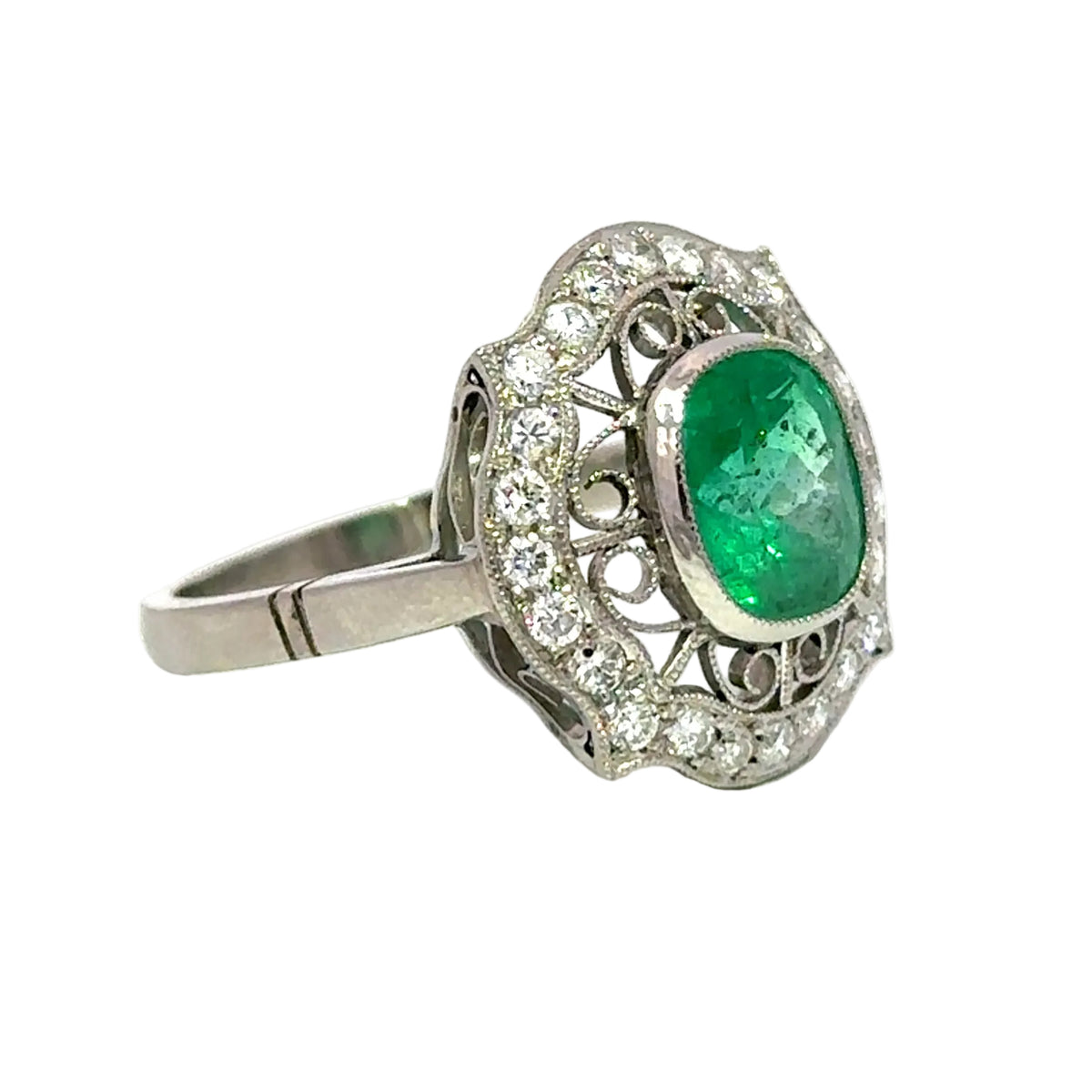 Cocktail Ring in Platinum, Emerald, and Diamonds