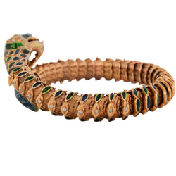 Bracelet en or jaune, émail, rubis et diamants