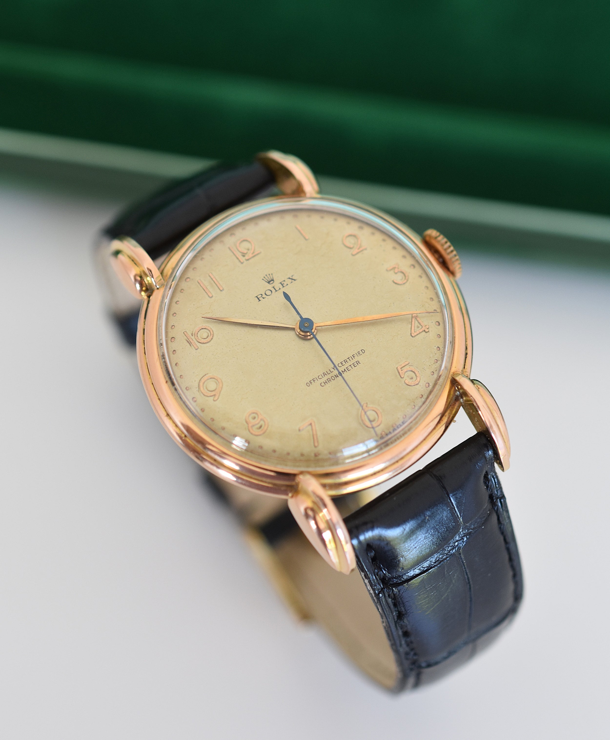 ROLEX "Chronometer" watch in rose gold, steel, and leather