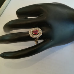 Yellow gold ring with rubies and diamonds