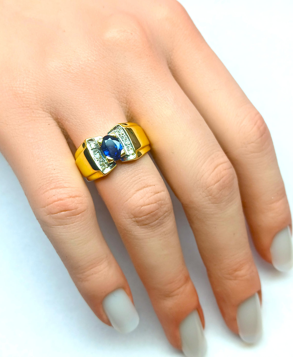 Tank Ring in white gold, yellow gold, sapphire, and diamonds