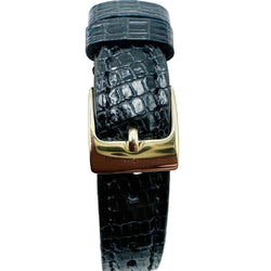 BAUME & MERCIER Watch in yellow gold and leather