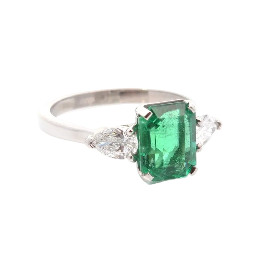 Trilogy Ring in Platinum, Emerald, and Diamonds