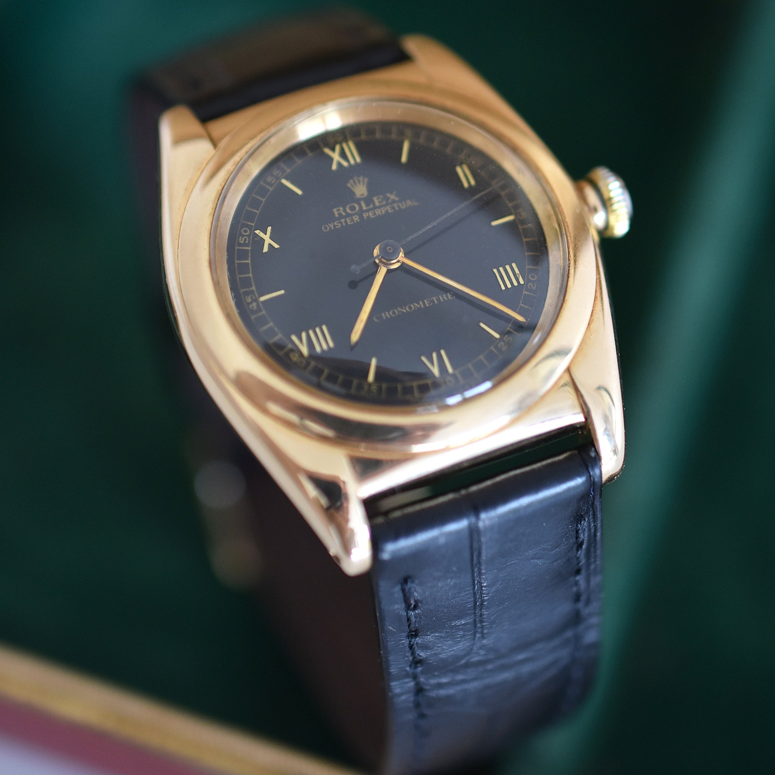 ROLEX "Oyster Perpetual Bubbleback Ovetto" watch in yellow gold and leather