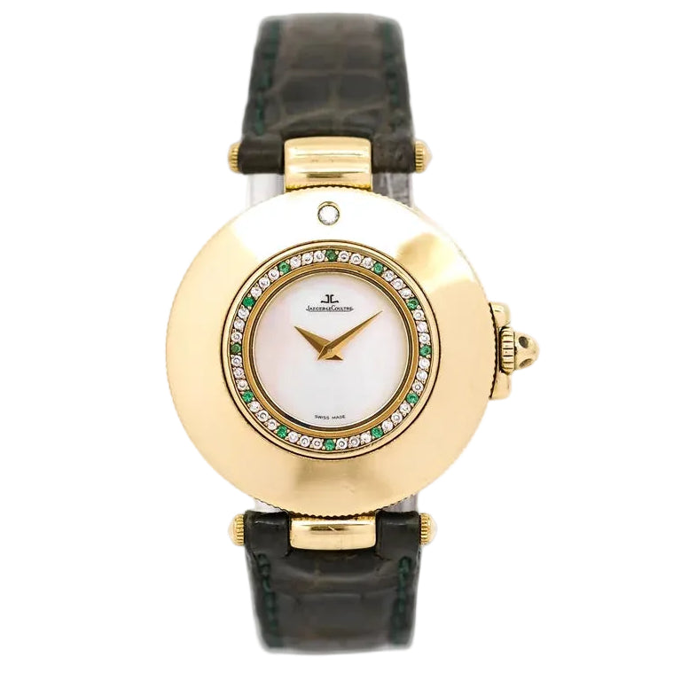 JAEGER-LECOULTRE watch in yellow gold, Mother-of-pearl, leather, emeralds, and diamonds