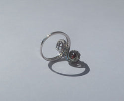 "Toi et Moi" Ring with 19th-Century Swirls, Garnets, Diamonds, and Platinum