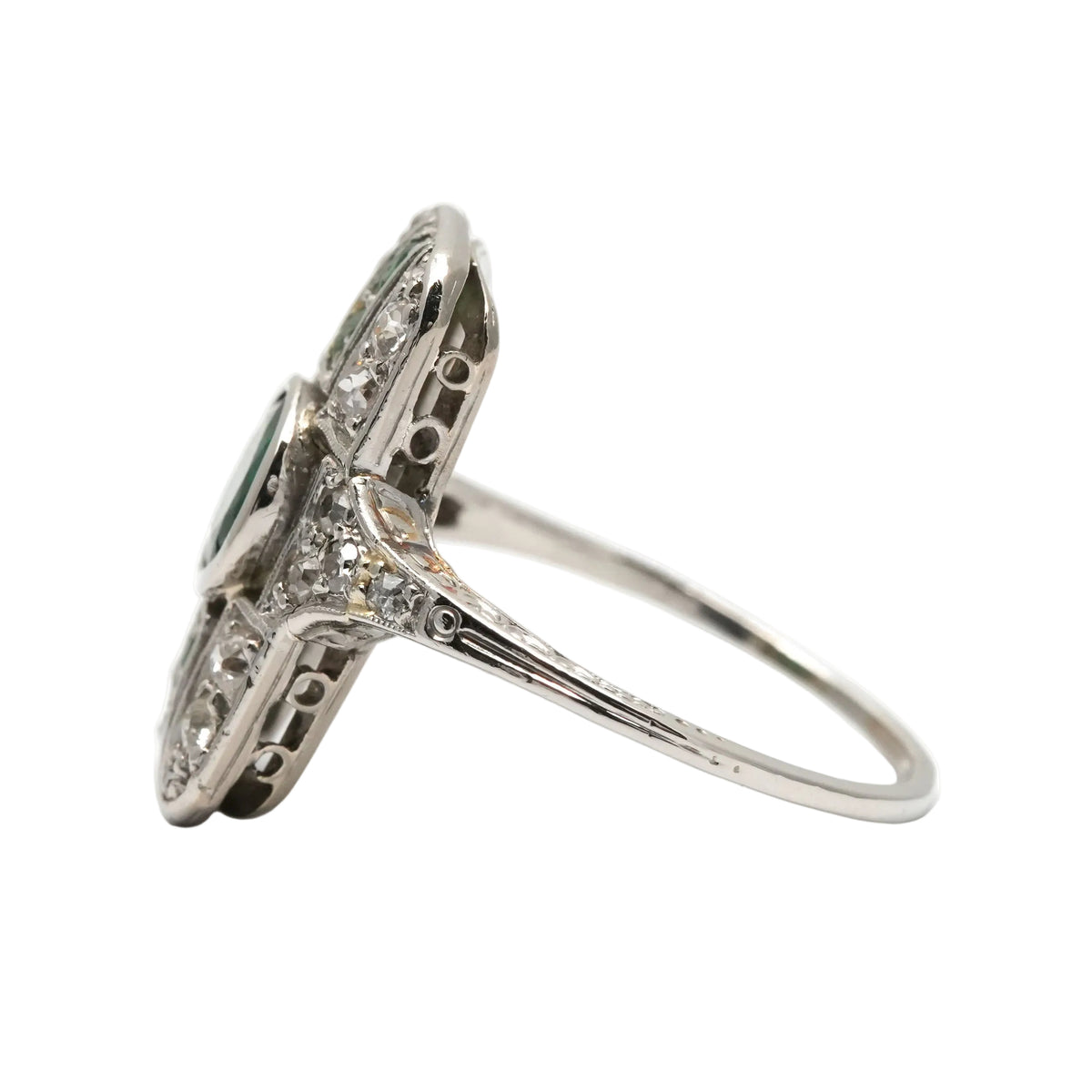 Art Deco ring in white gold, emeralds, and diamonds