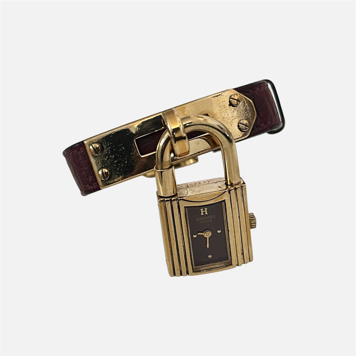 Montre HERMÈS Kelly en métal plaqué or et cuir
