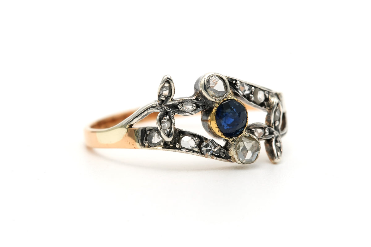 Ring in white gold, yellow gold, sapphires, and diamonds
