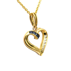 Yellow gold pendant with sapphires and diamonds