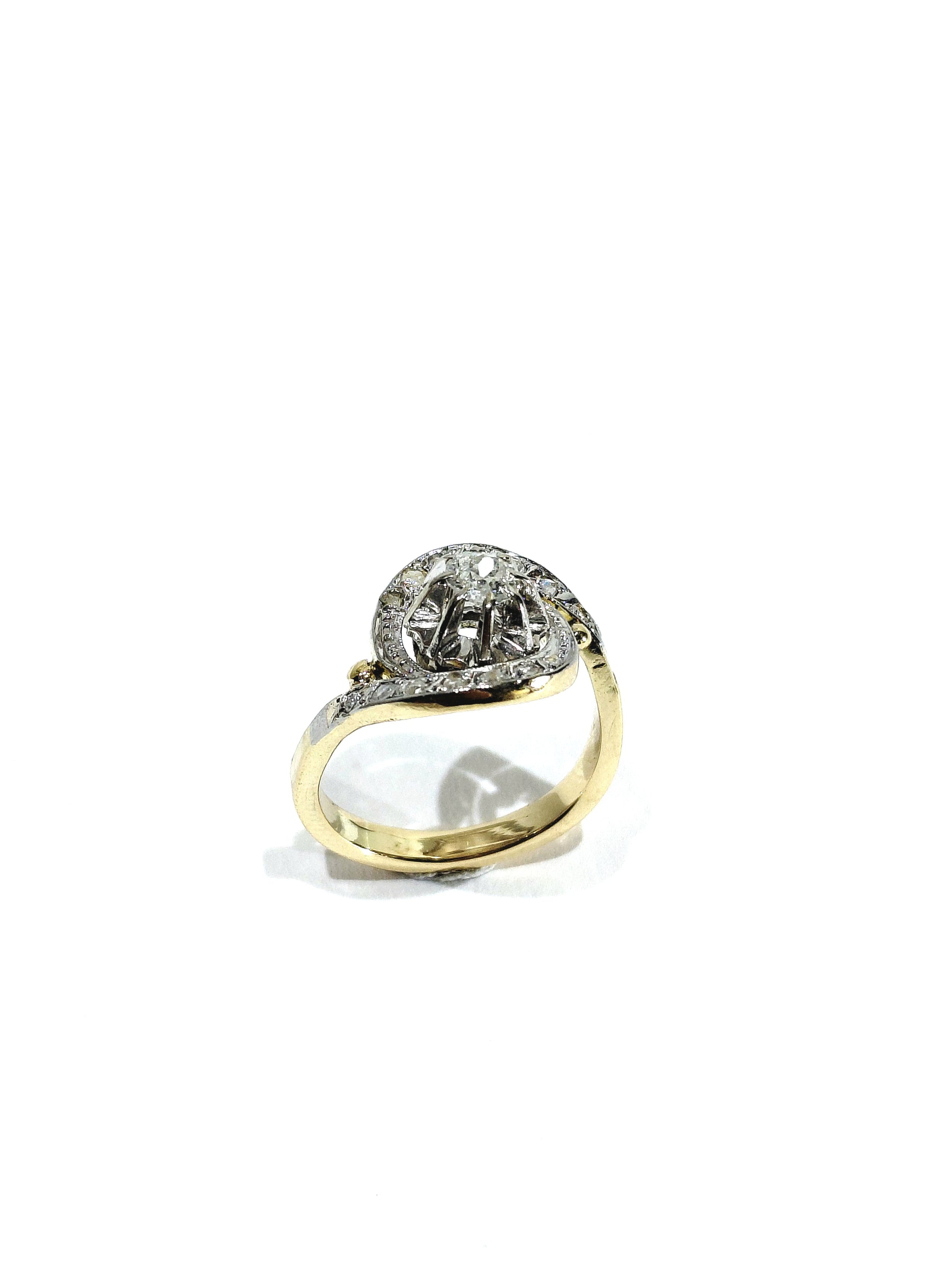Tourbillon ring in yellow gold, white gold, and diamonds