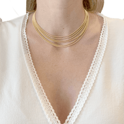 Collier Cartier, "Draperie", 6 rangs, or jaune.