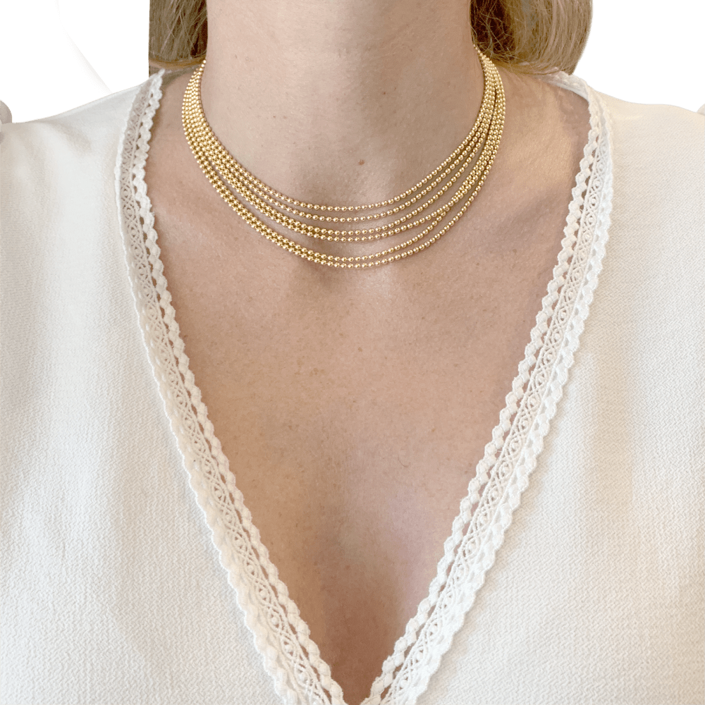 Collier Cartier, "Draperie", 6 rangs, or jaune.