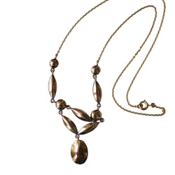 Yellow gold, Rose gold and Garnet Drapery Necklace