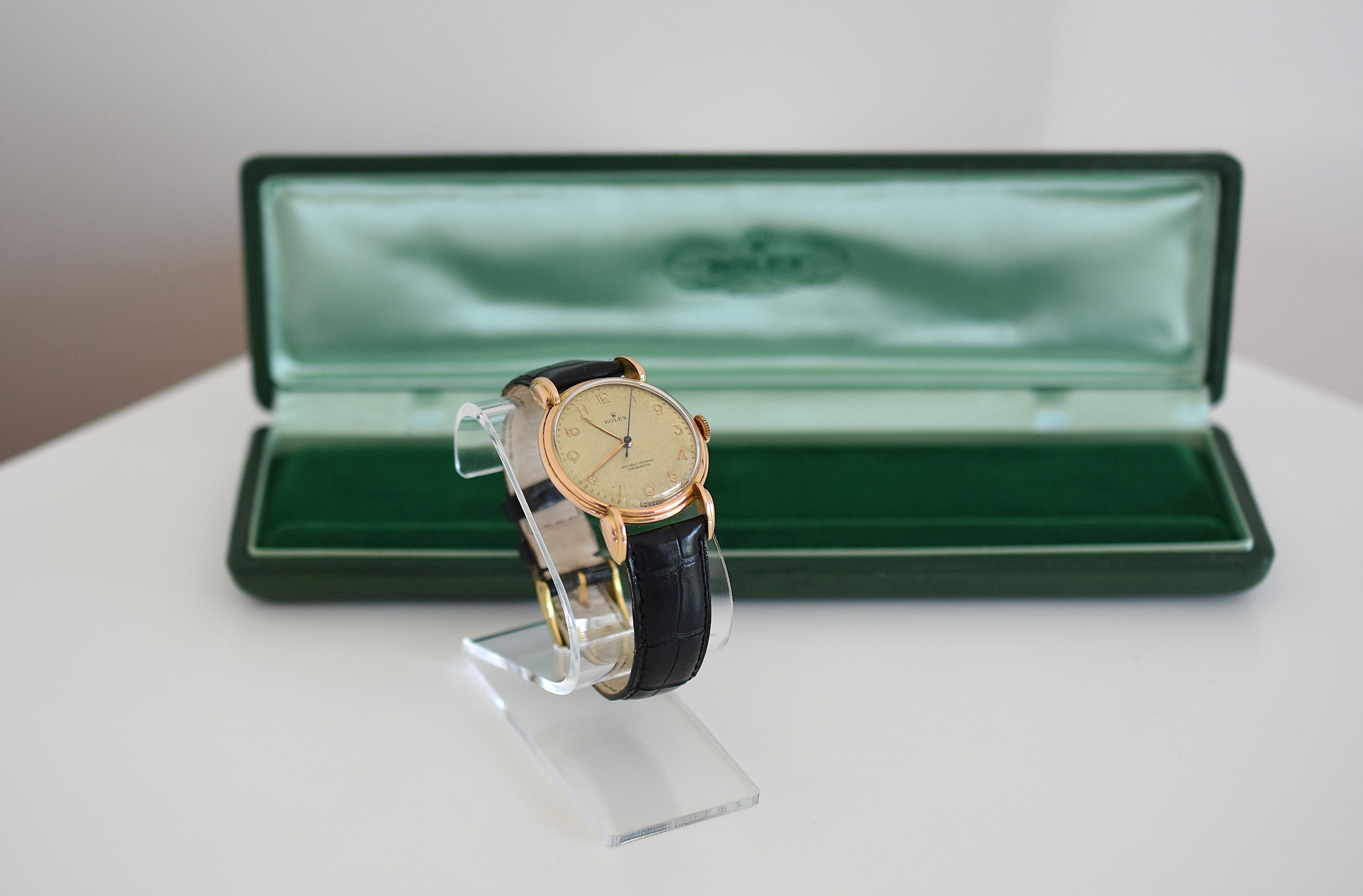 ROLEX "Chronometer" watch in rose gold, steel, and leather