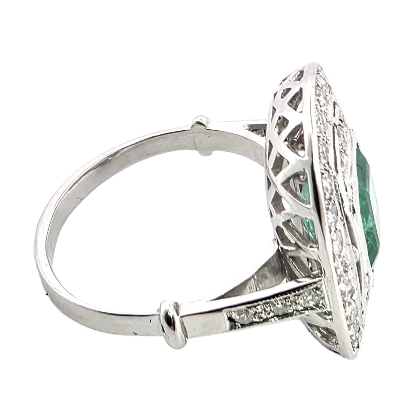 "Entourage" Ring in White Gold, Emerald, and Diamonds