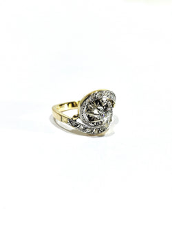 Tourbillon ring in yellow gold, white gold, and diamonds