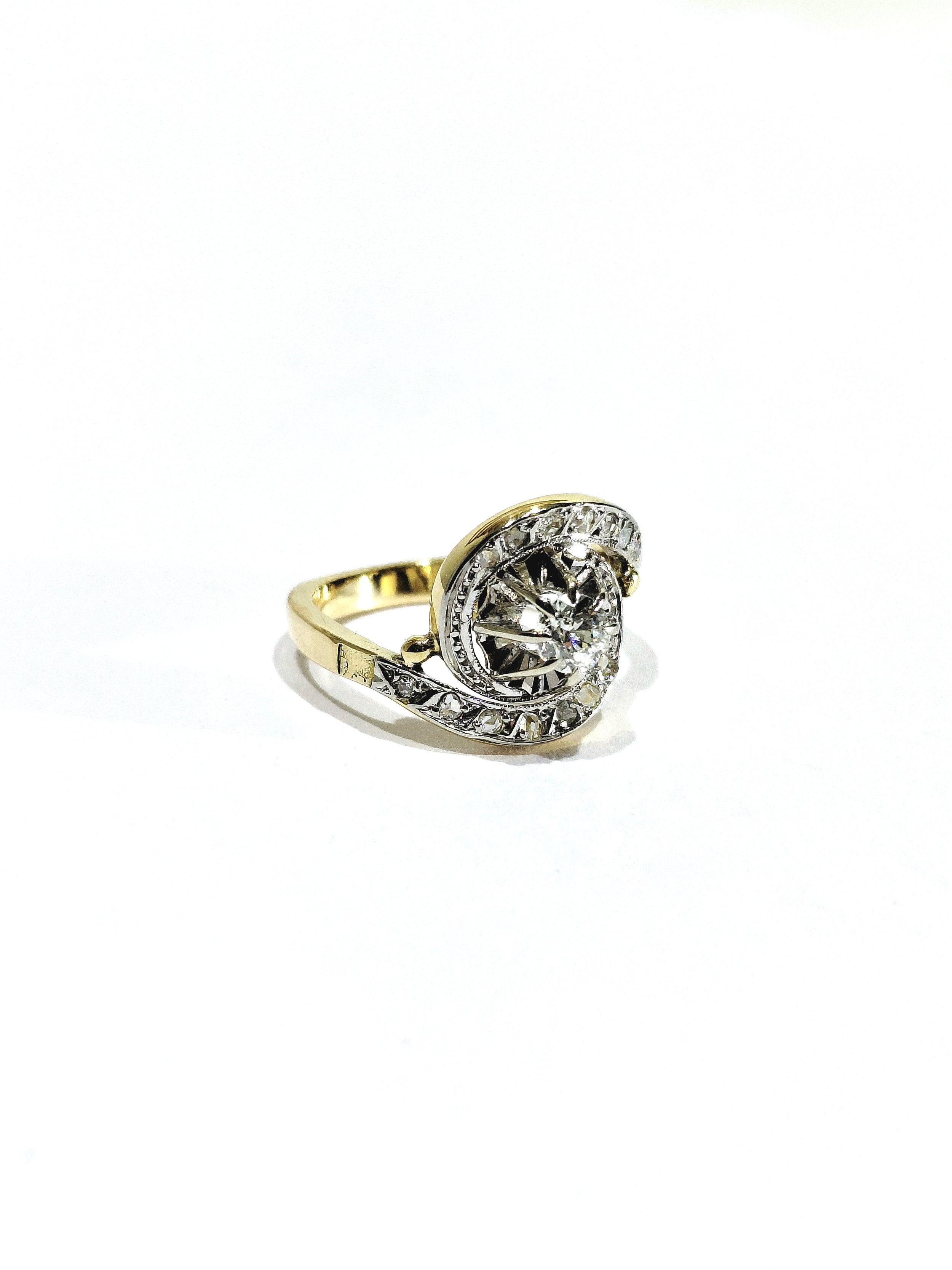 Tourbillon ring in yellow gold, white gold, and diamonds
