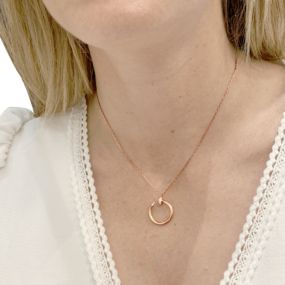 Collier Cartier, "Juste un Clou", or rose et diamants.
