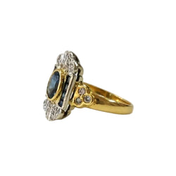 Ring in white gold, yellow gold, sapphires, and diamonds