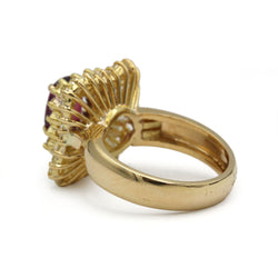 Entourage Ring in yellow gold, rubies, and diamonds