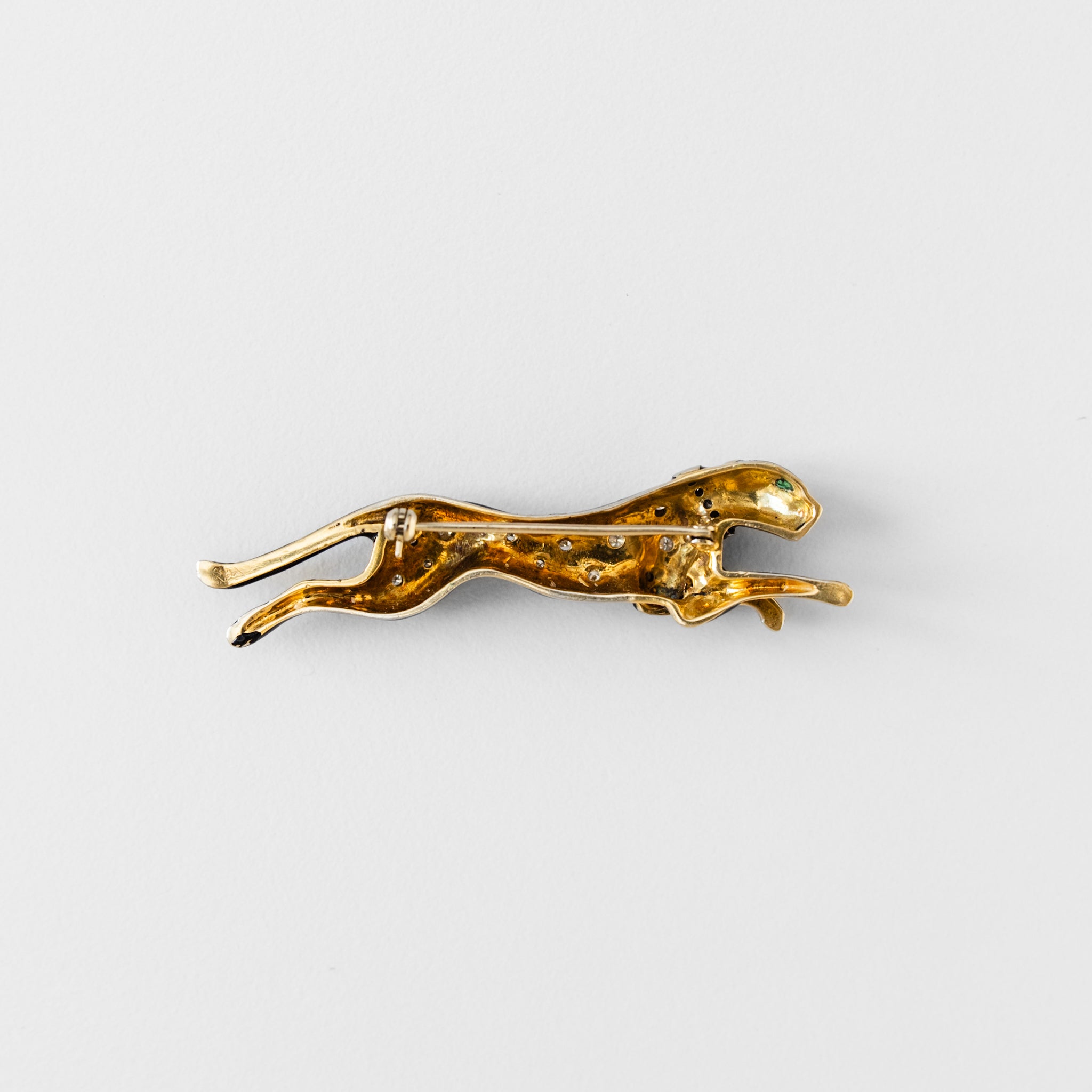 Broche panthère André VASSORT en or jaune et émail noir