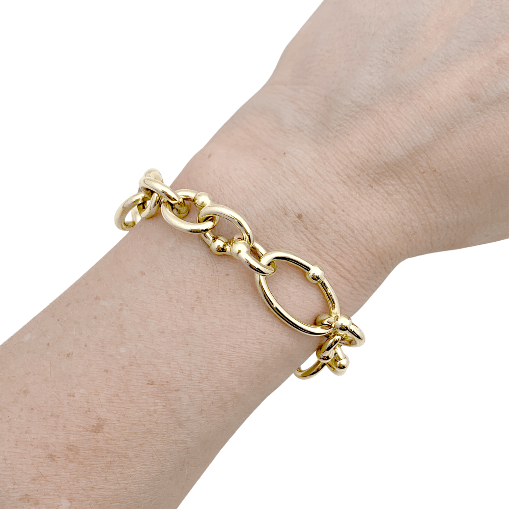 Bracelet oval and circular links yellow gold.