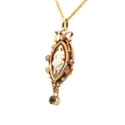Yellow gold pendant with a pearl cameo and rhinestones