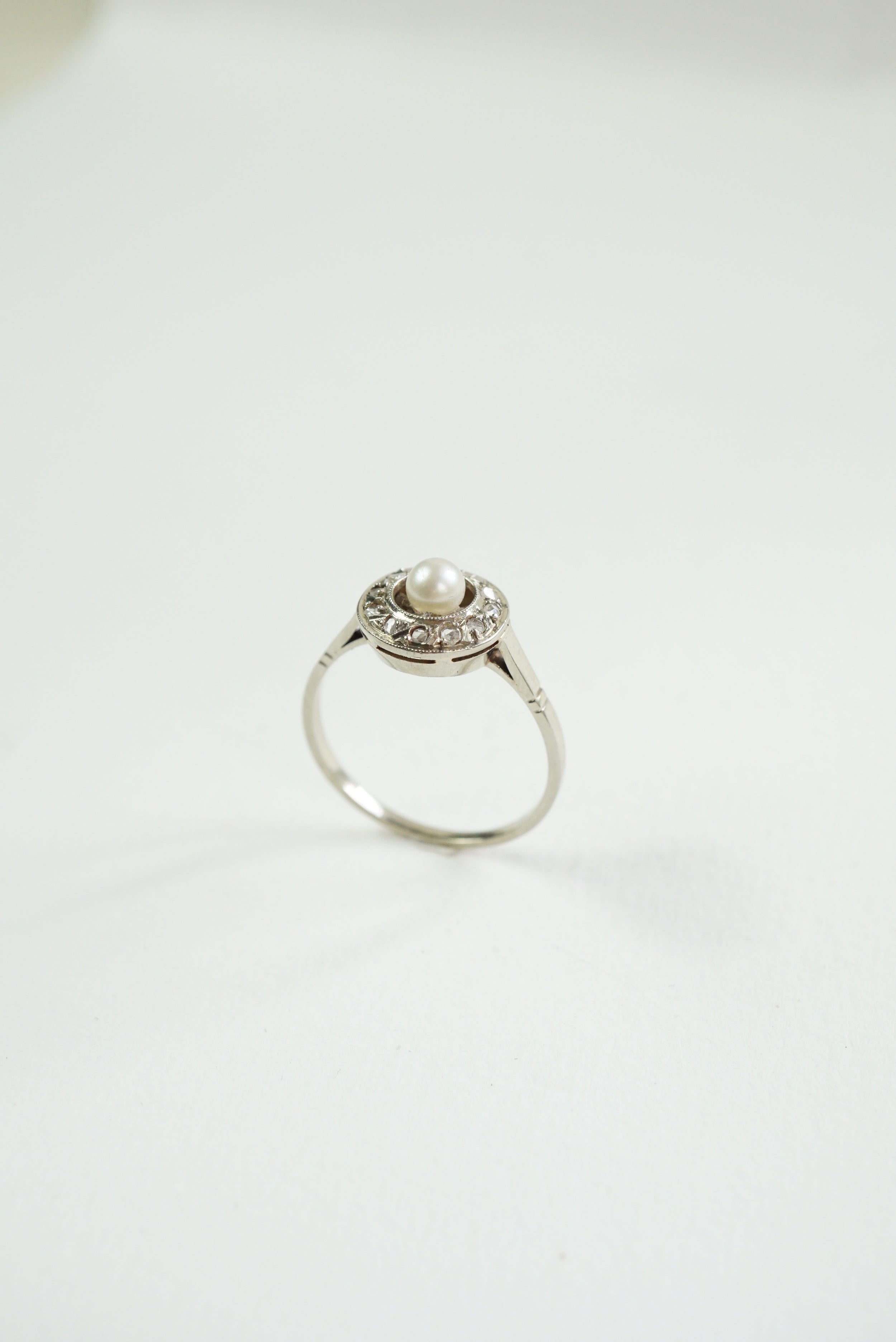Gold Target Ring with Diamonds and a Pearl