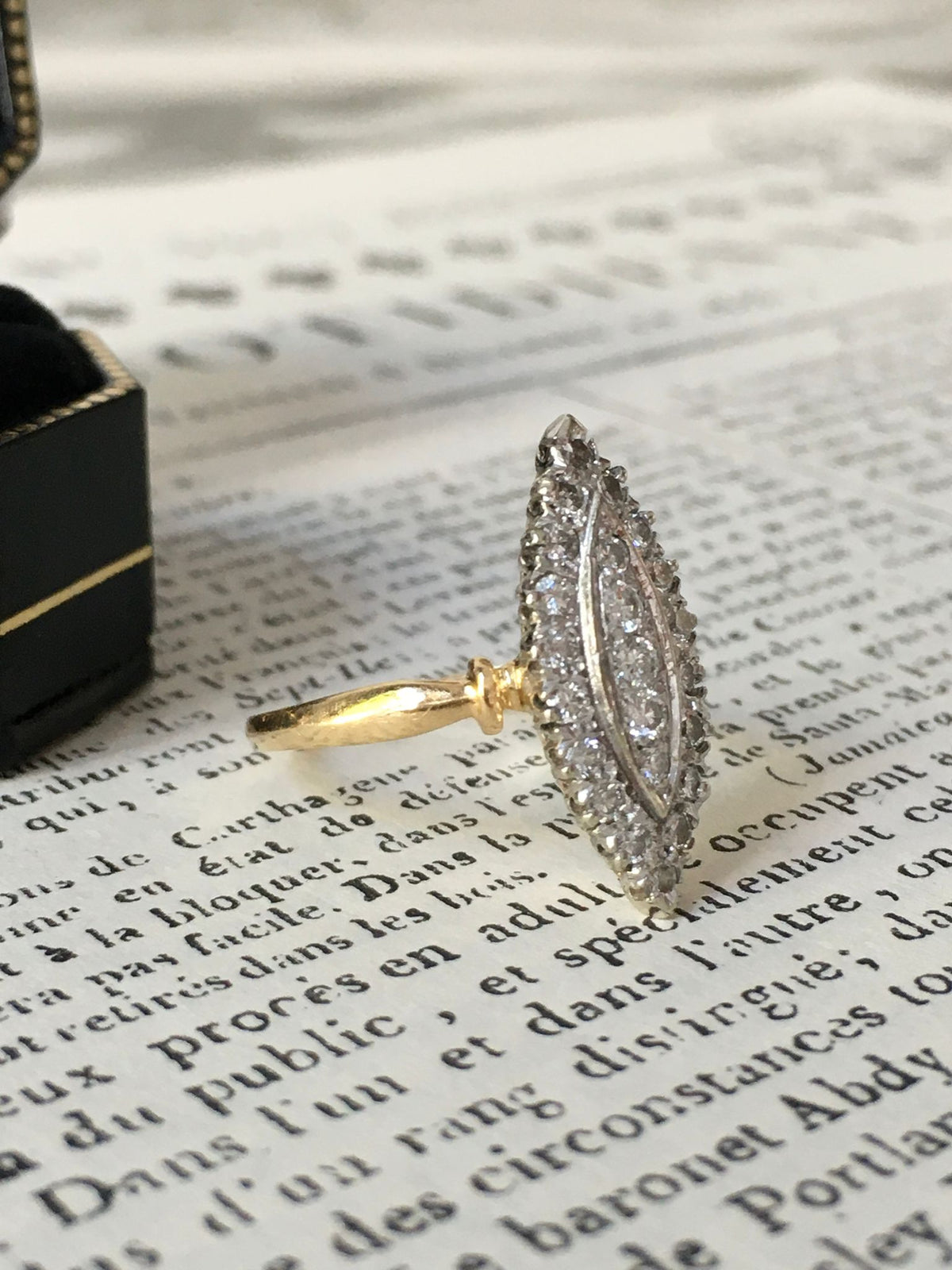 Marquise Ring in White Gold, Yellow Gold, and Diamonds