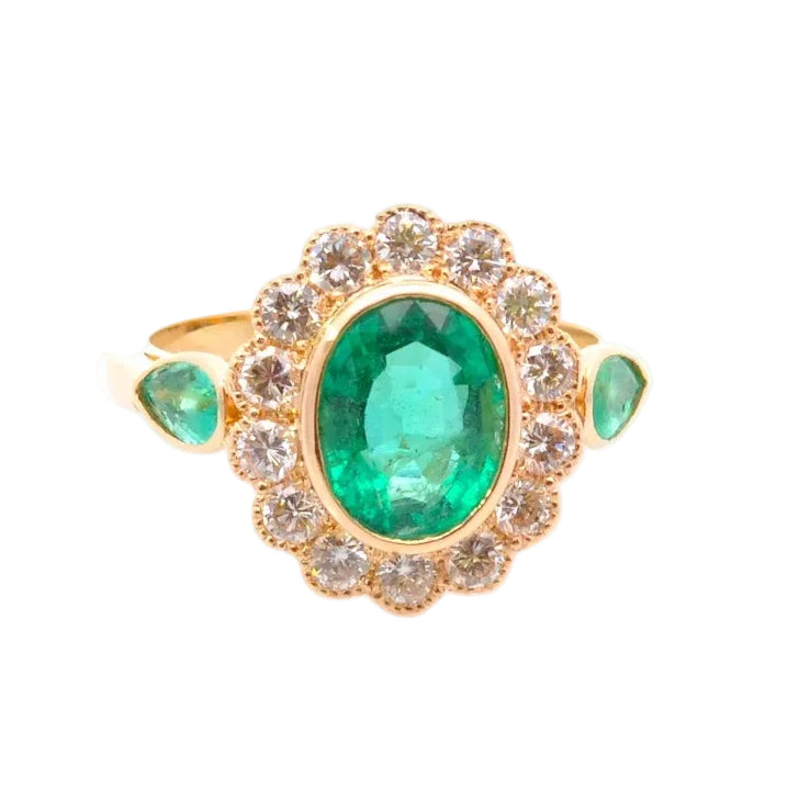 Entourage Ring in yellow gold, emeralds, and diamonds
