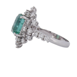"Entourage" Ring in White Gold, Emerald, and Diamonds