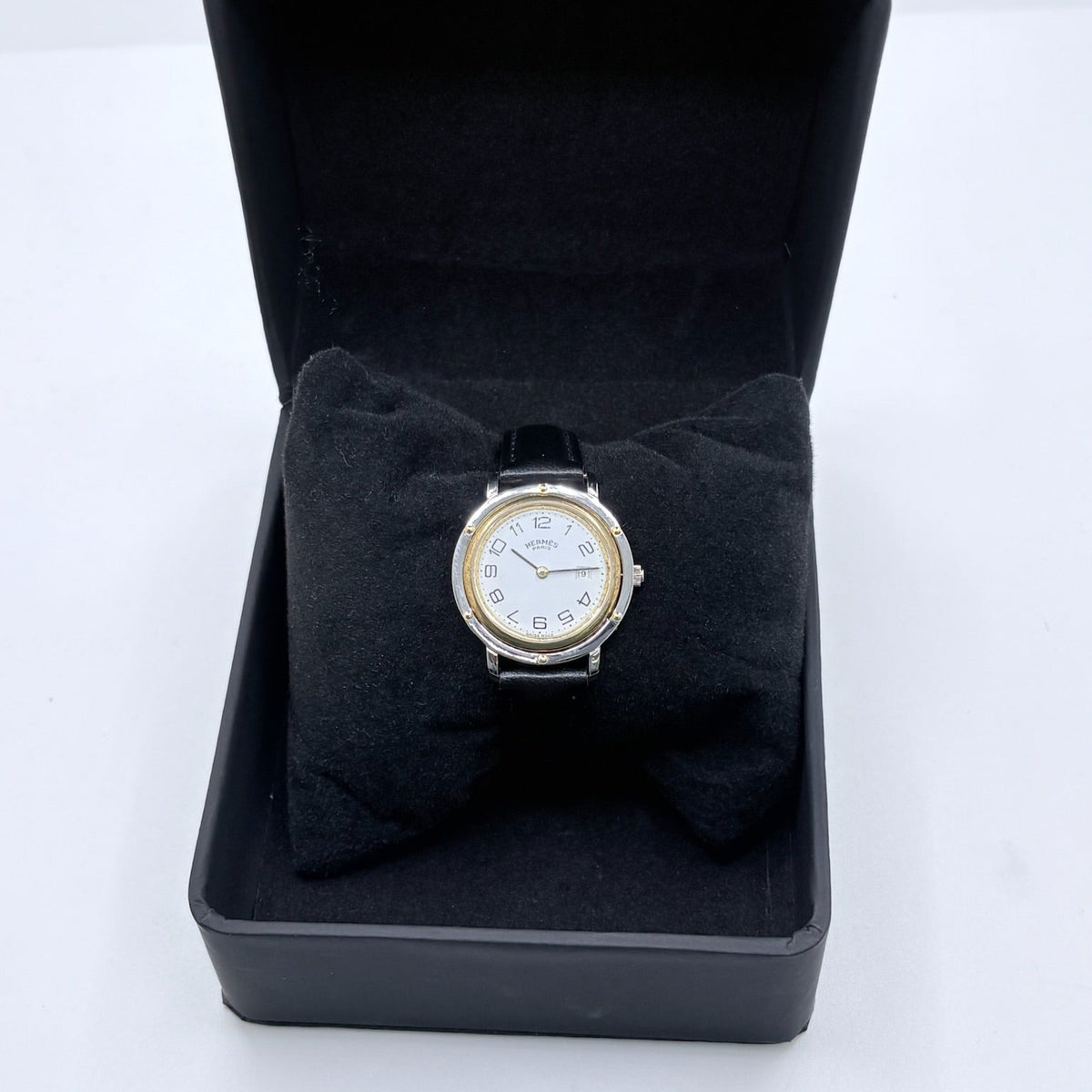 HERMÈS "Clipper" Watch in yellow gold, stainless steel, and leather